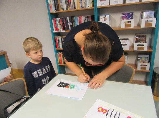 Starszaki w bibliotece