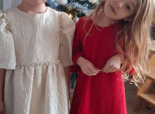 Gr. IV Przy wigilijnym stole ze świątecznymi życzeniami.