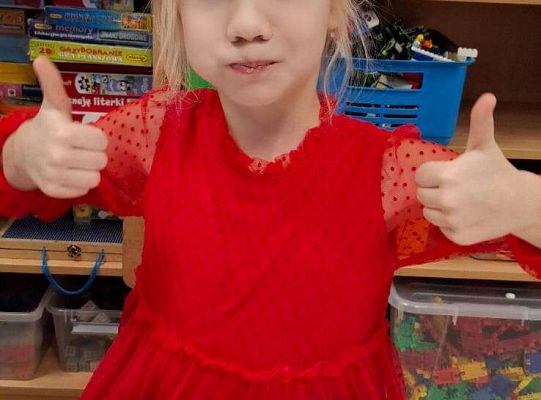 Gr. IV Przy wigilijnym stole ze świątecznymi życzeniami.